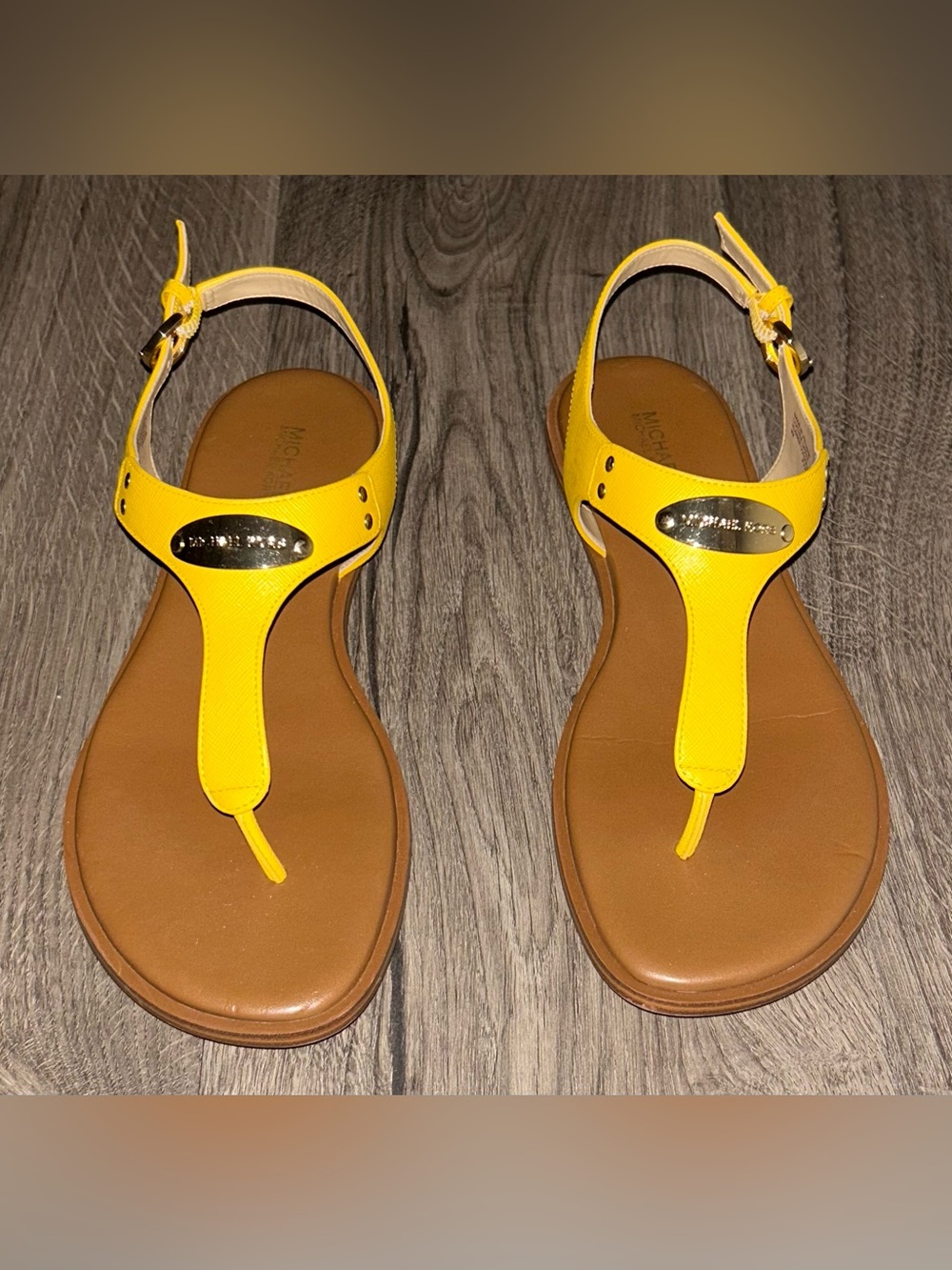 Michael Kors Sunflower Yellow T-Strap Leather Sandals with Gold Plaque